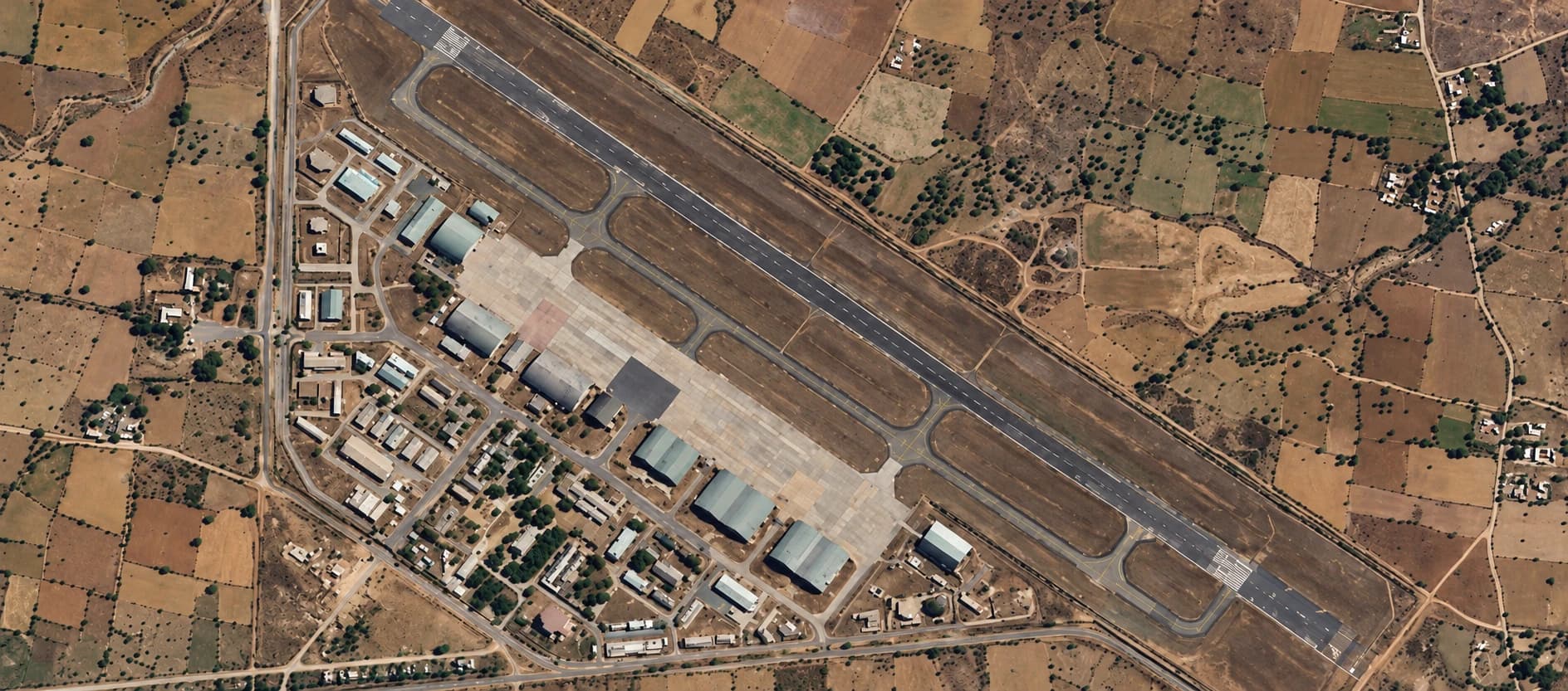 Satellite view of an airfield with the drone's planned flight route